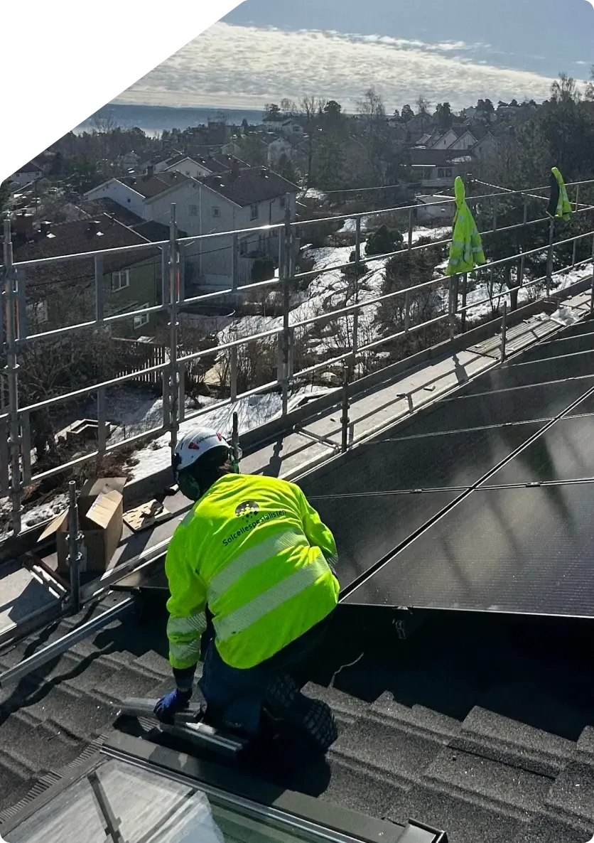 Installer at work on the roof of a building