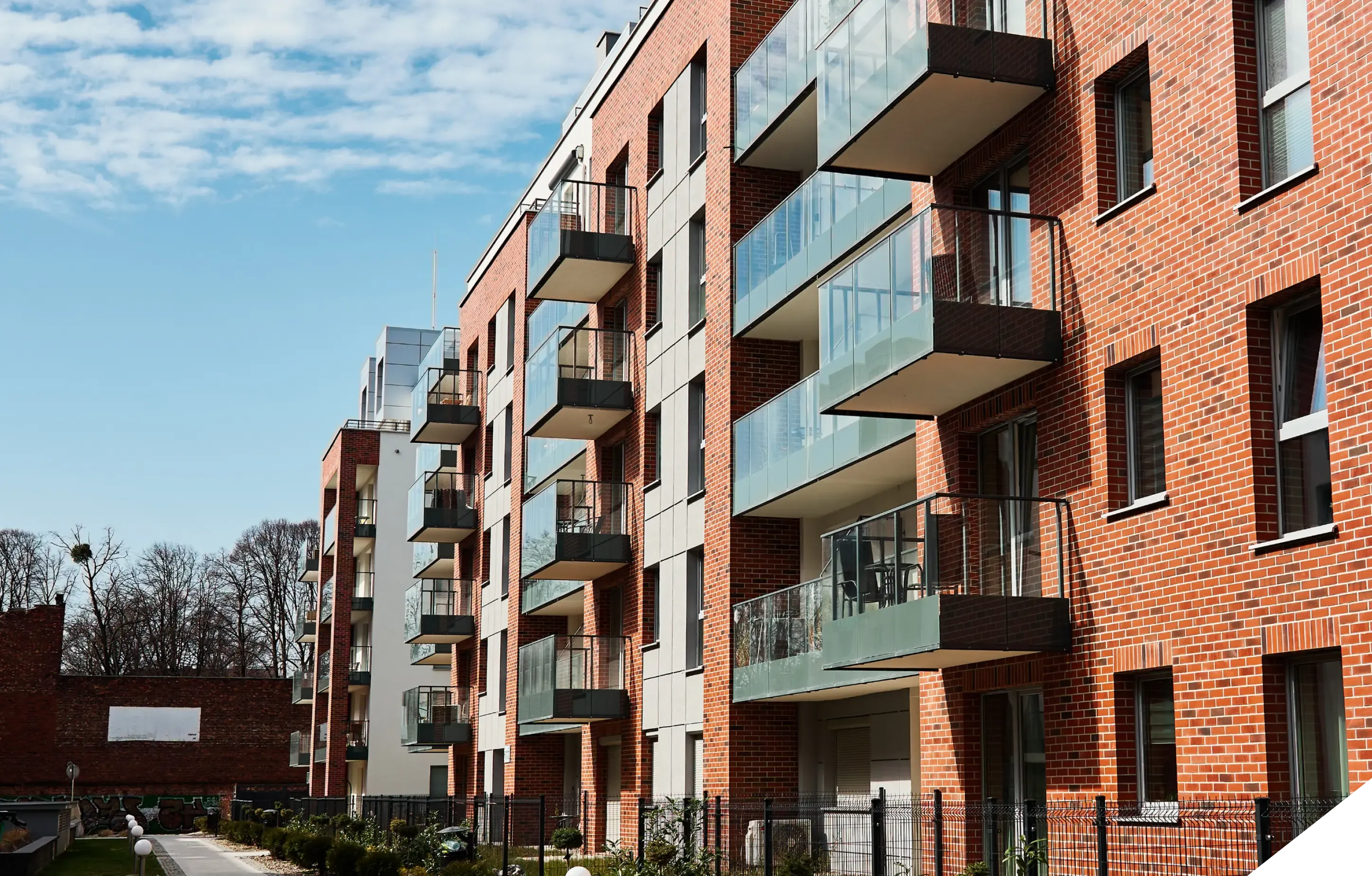 Brick apartment block with balconies