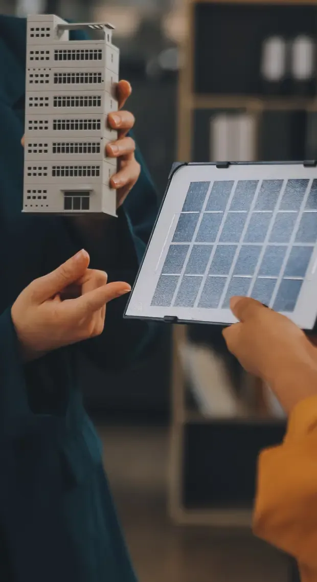 Two colleagues looking at a tablet together